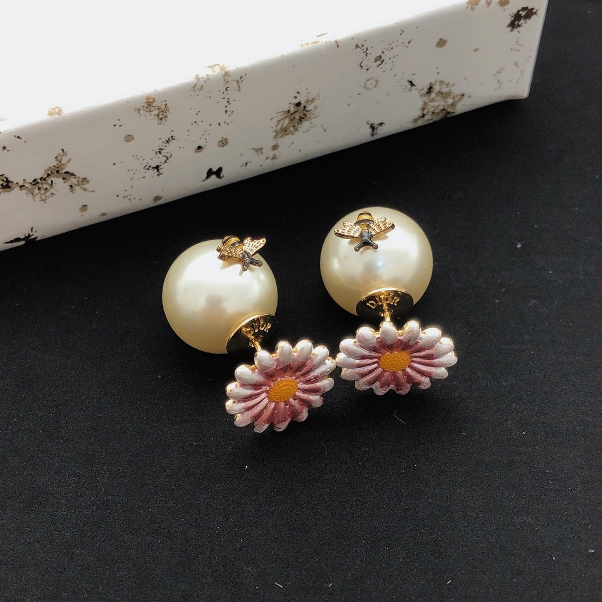 Martin Graham stud earrings in polished metal-tone