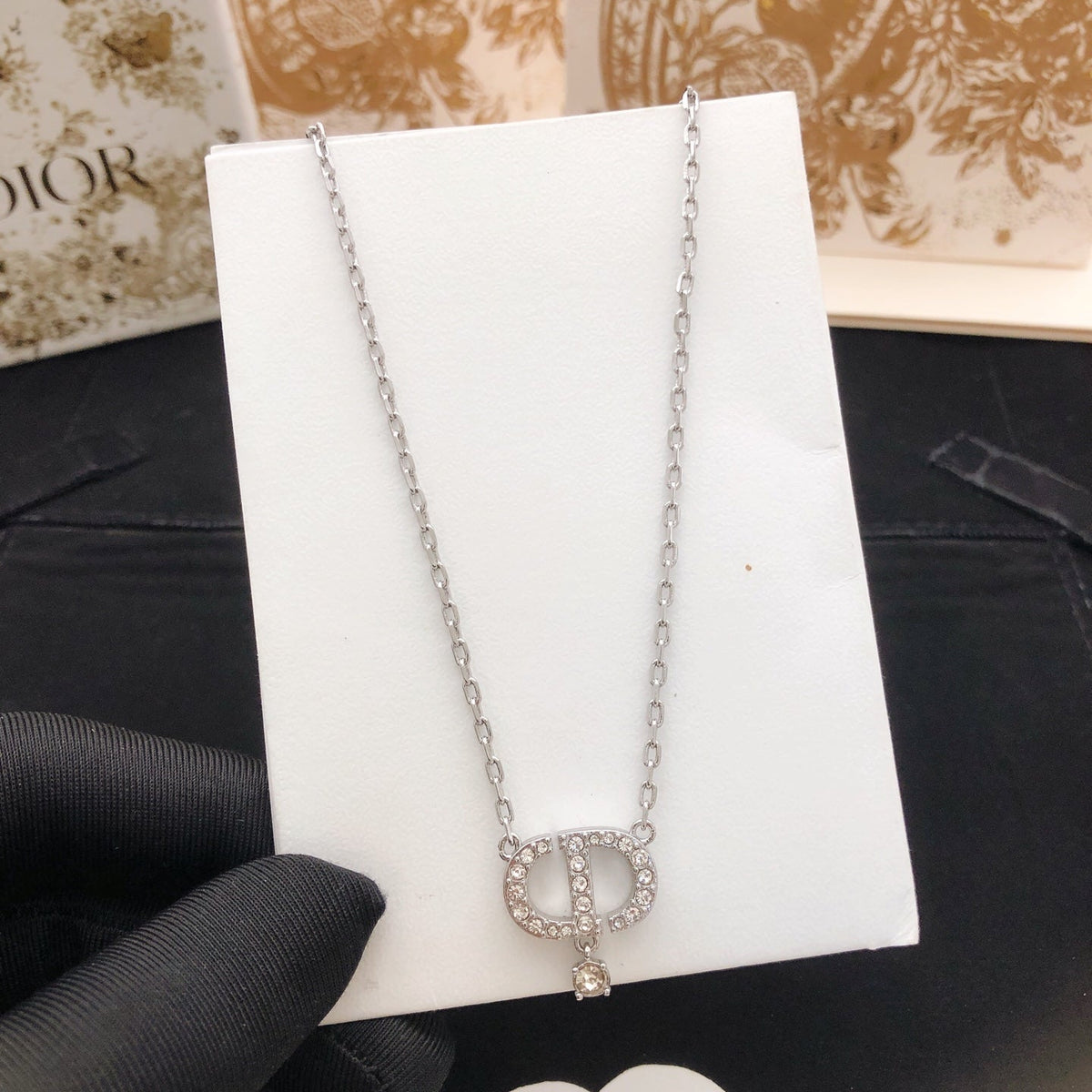 Martin Graham pendant necklace in polished metal-tone