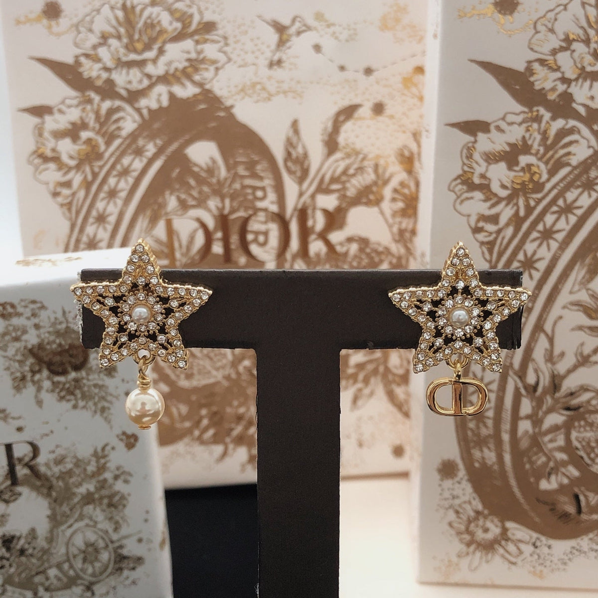 Martin Graham stud earrings in polished metal-tone