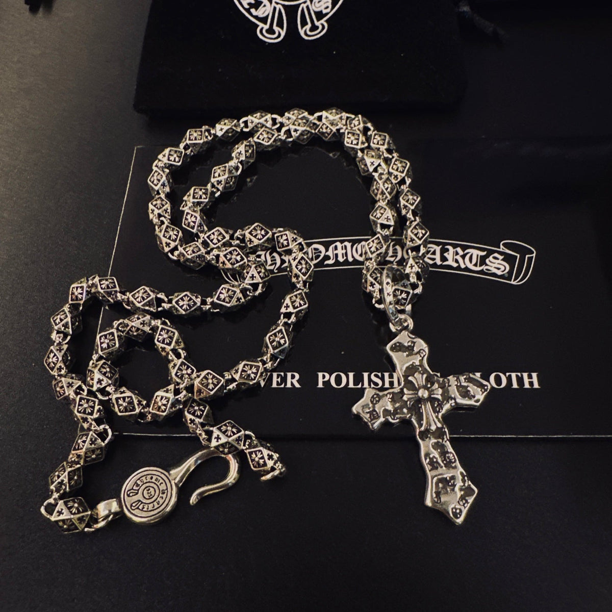 Martin Graham pendant necklace in polished metal-tone – close-up detail