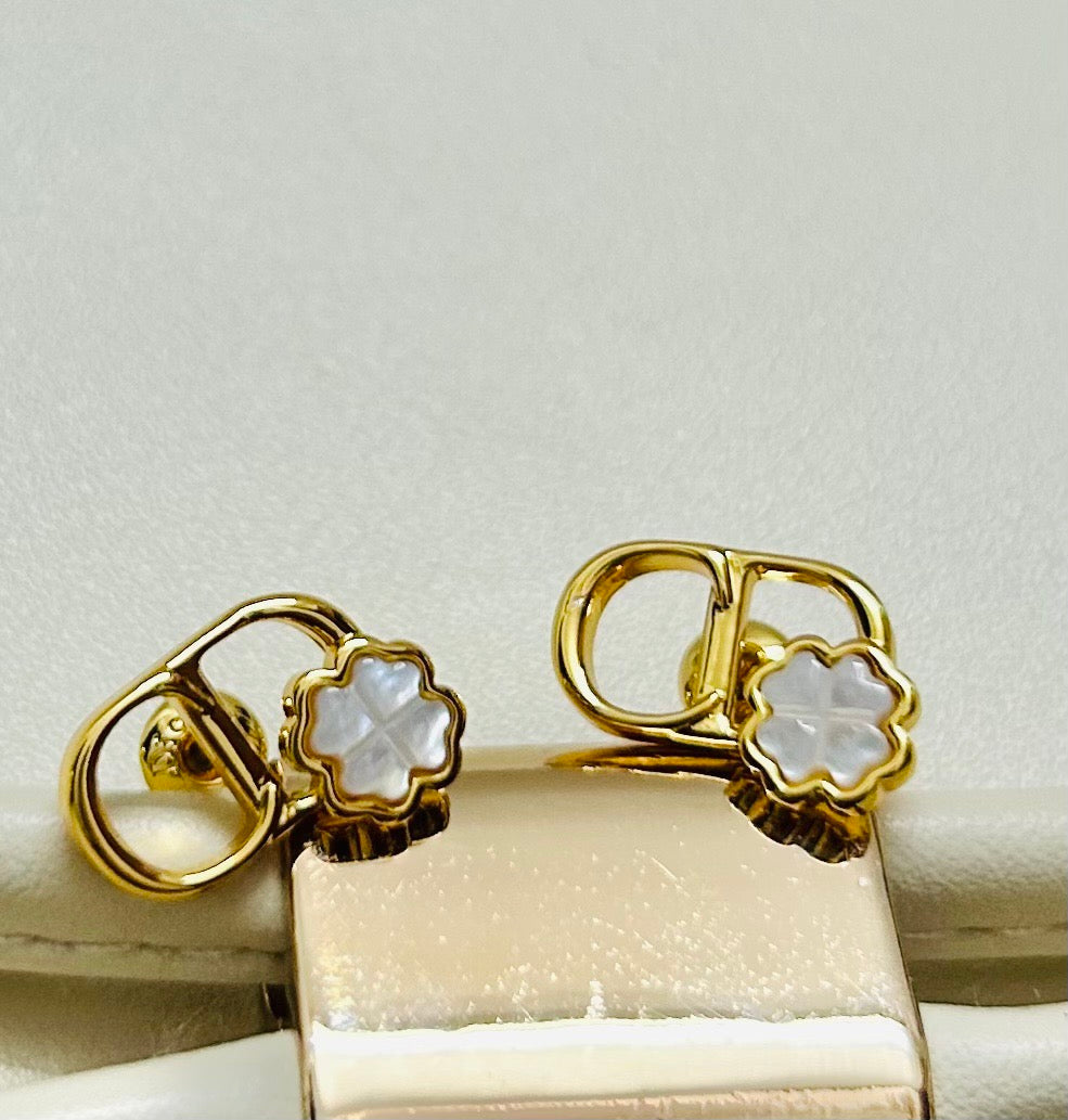 Martin Graham earrings in polished metal-tone