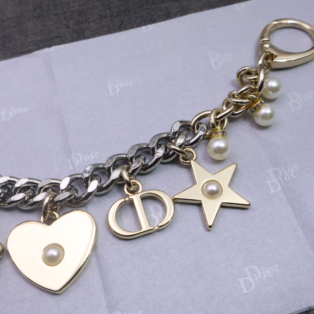 Martin Graham jewelry accessory in polished metal-tone