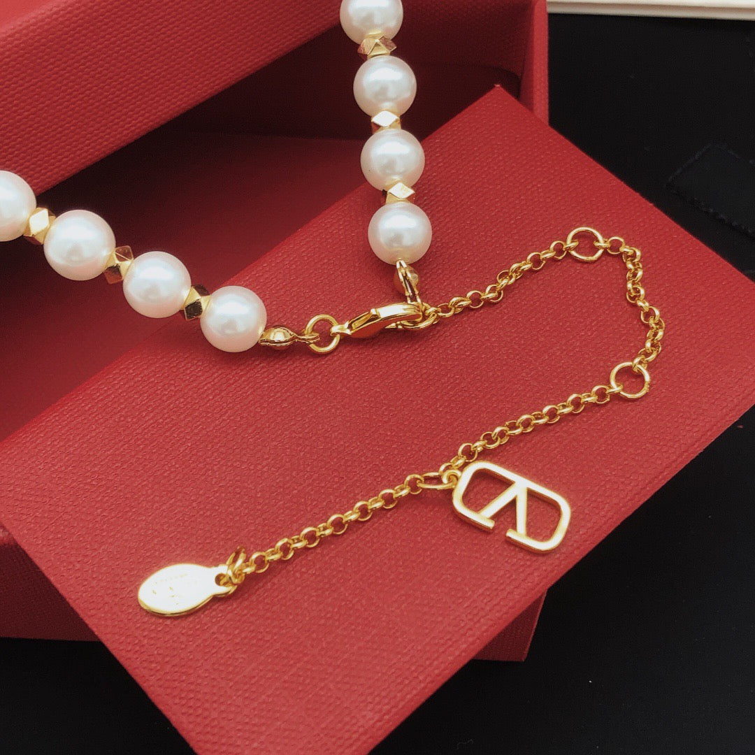Martin Graham pendant necklace in polished metal-tone