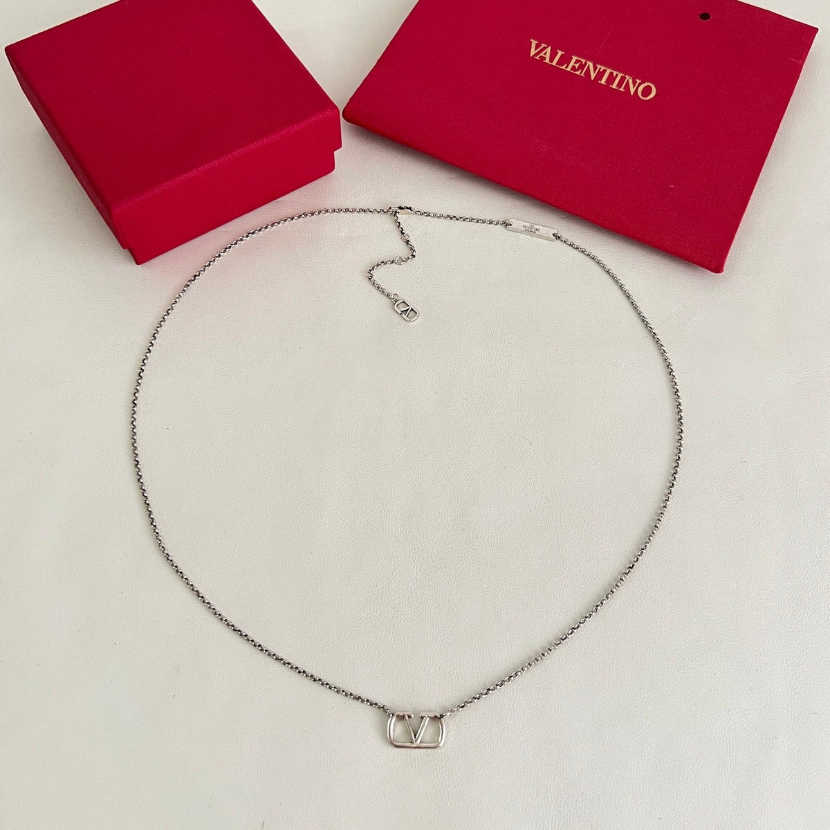 Martin Graham pendant necklace in polished metal-tone