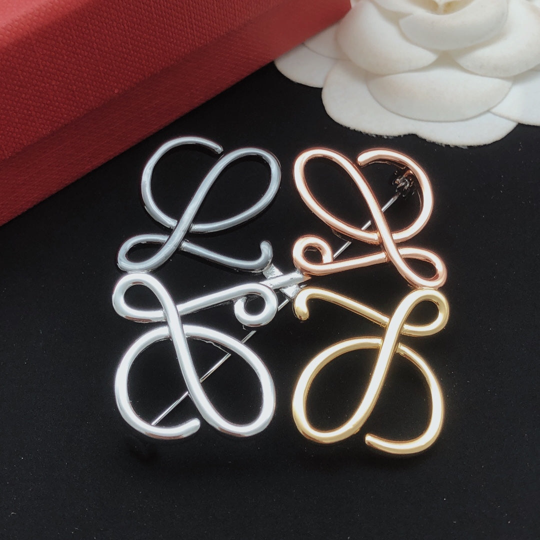 Martin Graham brooch in polished metal-tone