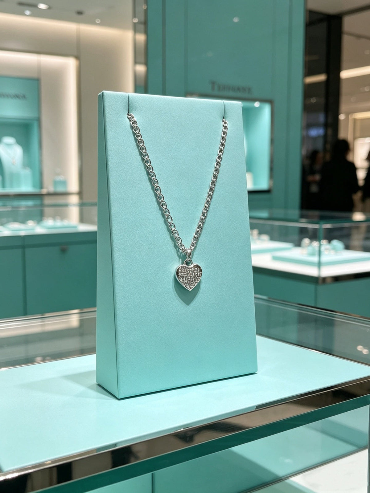 Martin Graham pendant necklace in polished metal-tone – close-up detail