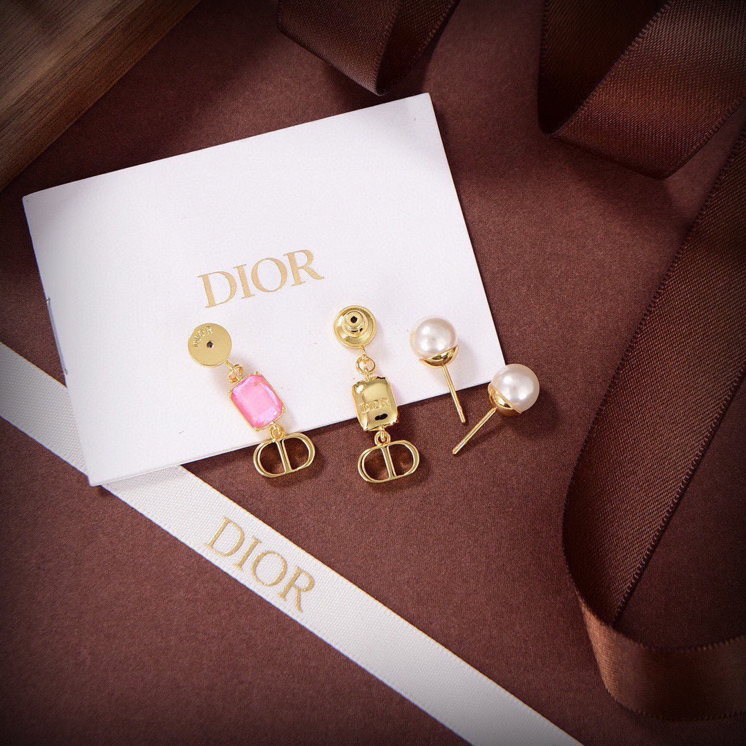 Martin Graham stud earrings in polished metal-tone