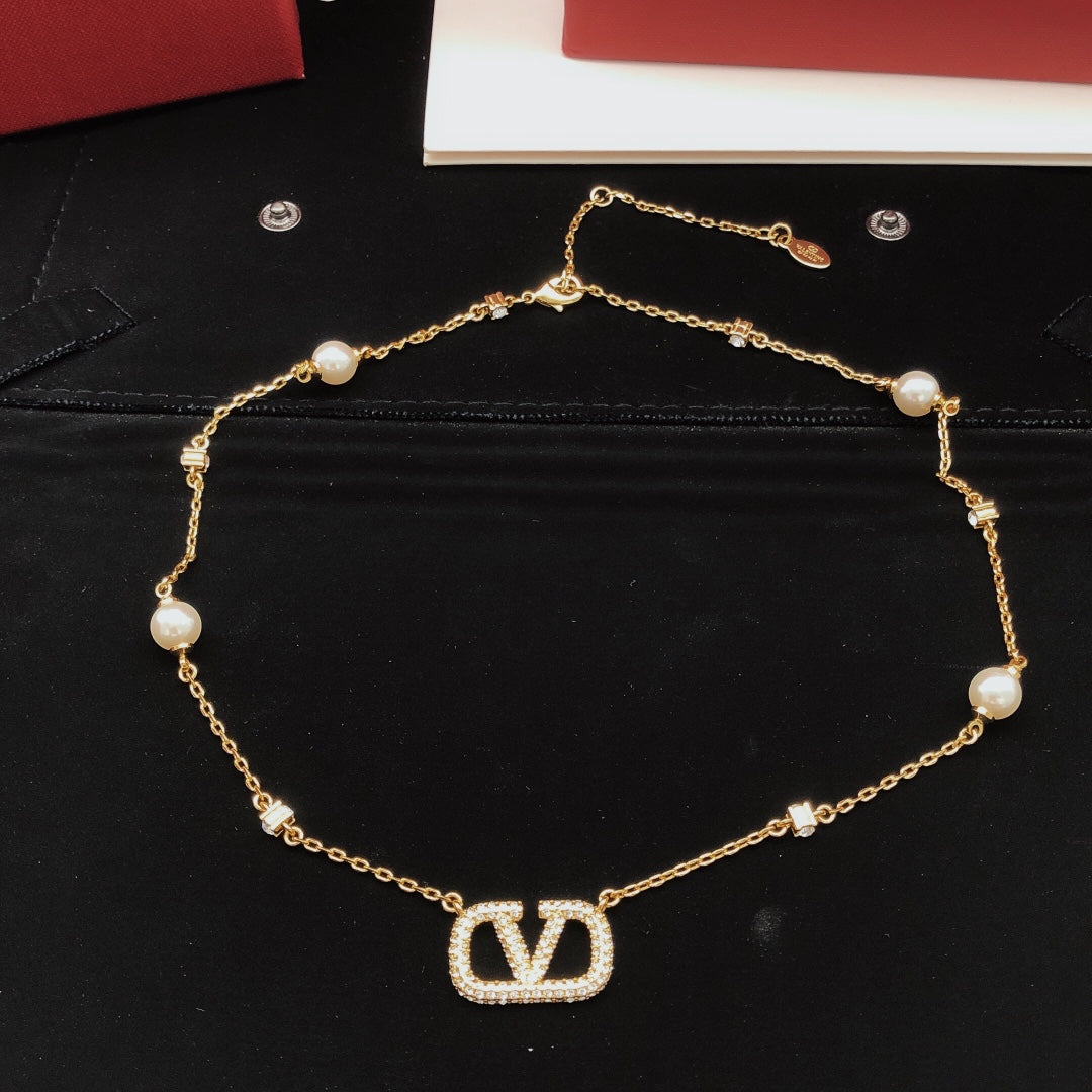 Martin Graham pendant necklace in polished metal-tone