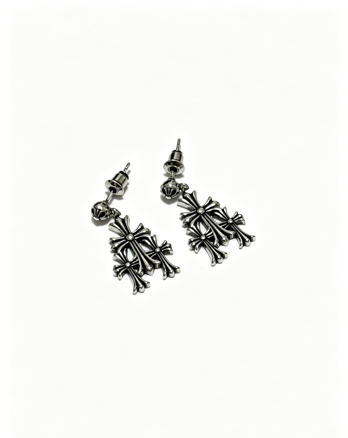 Martin Graham earrings in polished metal-tone – close-up detail