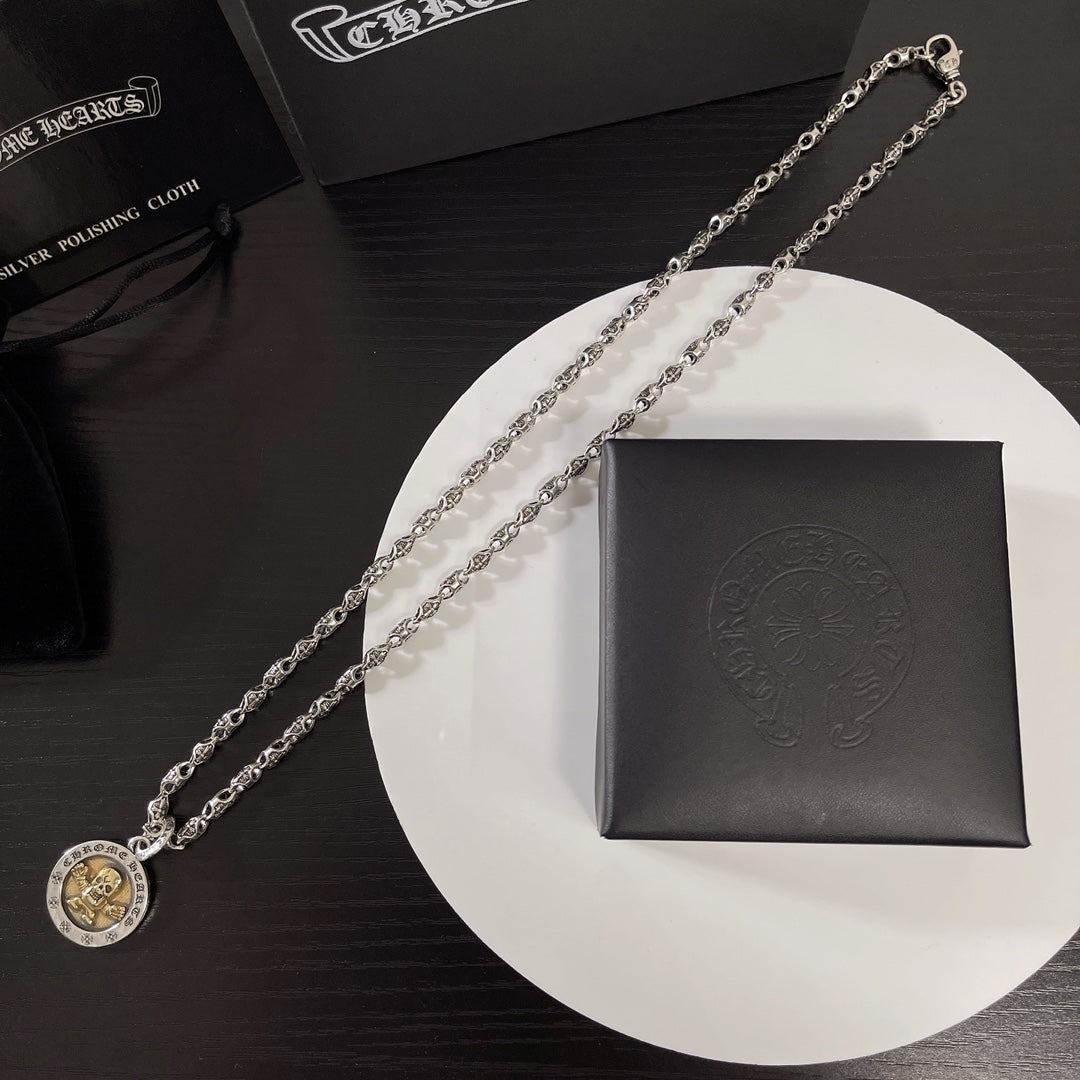 Martin Graham pendant necklace in polished metal-tone – close-up detail
