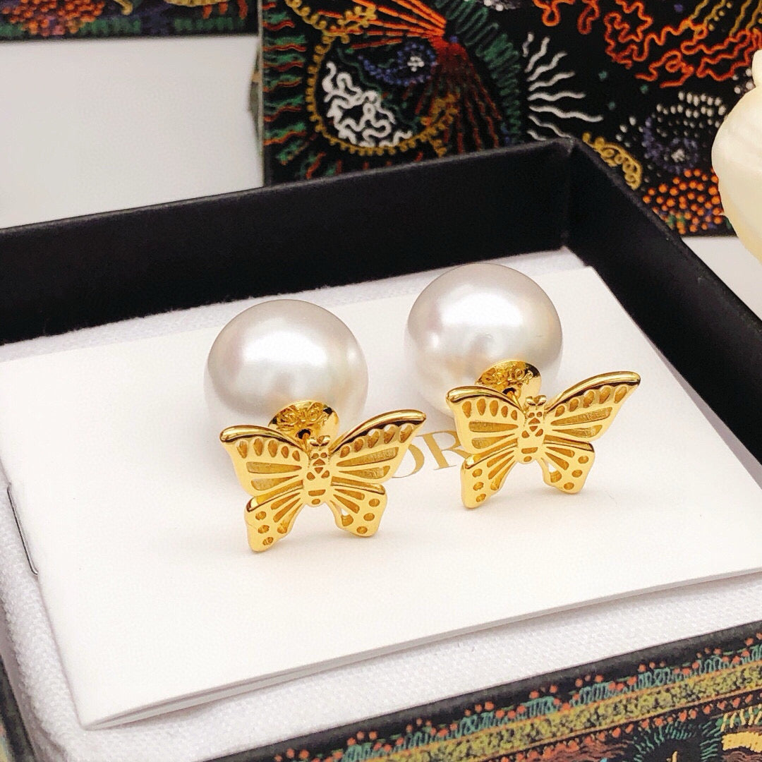 Martin Graham stud earrings in polished metal-tone