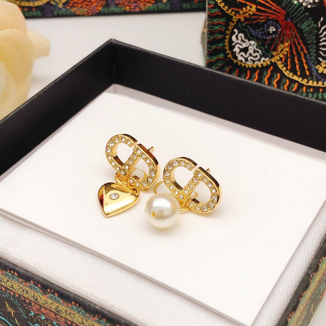 Martin Graham stud earrings in polished metal-tone
