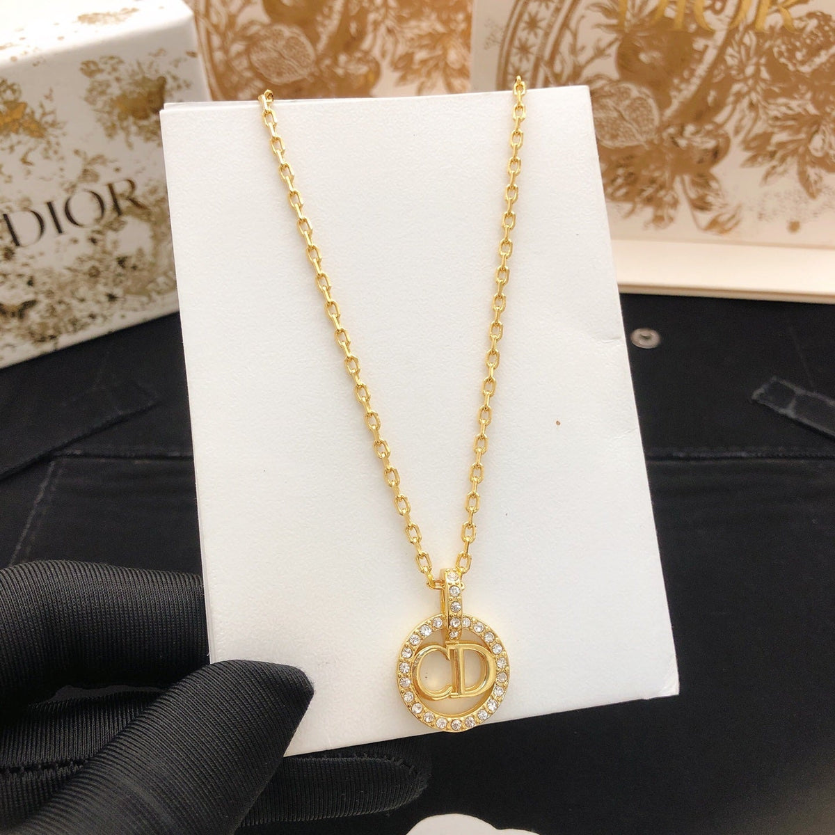 Martin Graham pendant necklace in polished metal-tone