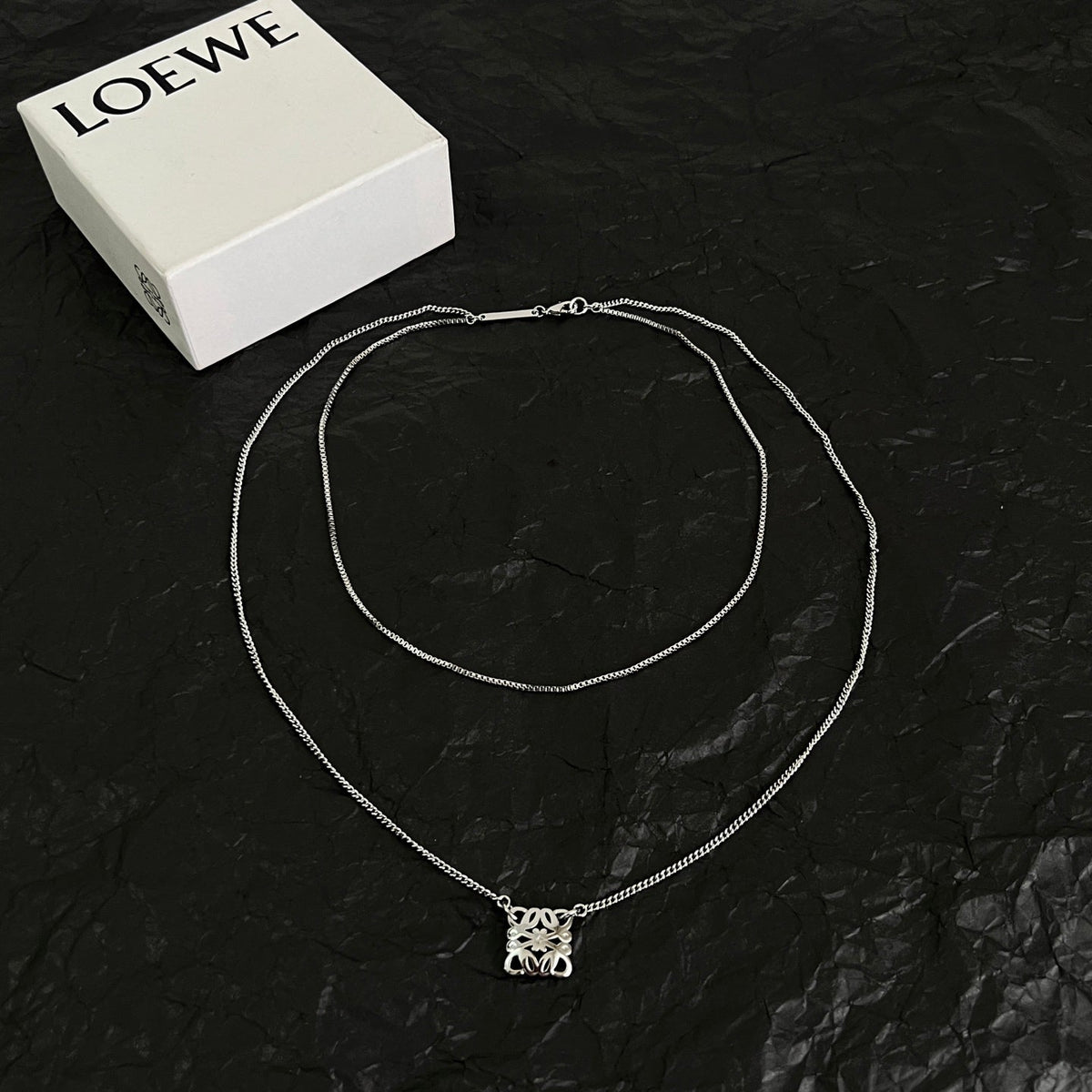 Martin Graham pendant necklace in polished metal-tone