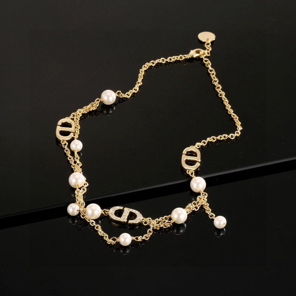 Martin Graham pendant necklace in polished metal-tone