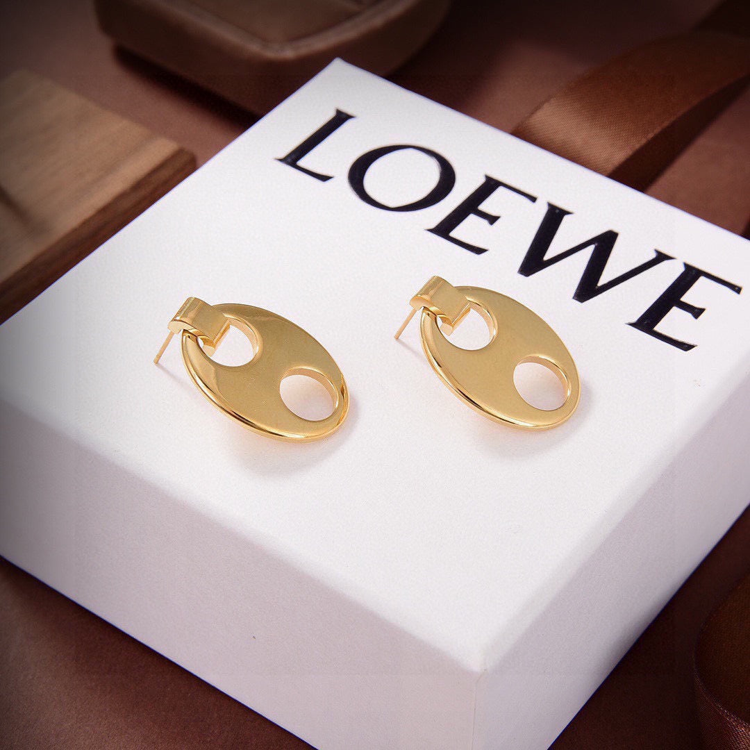 Martin Graham stud earrings in polished metal-tone