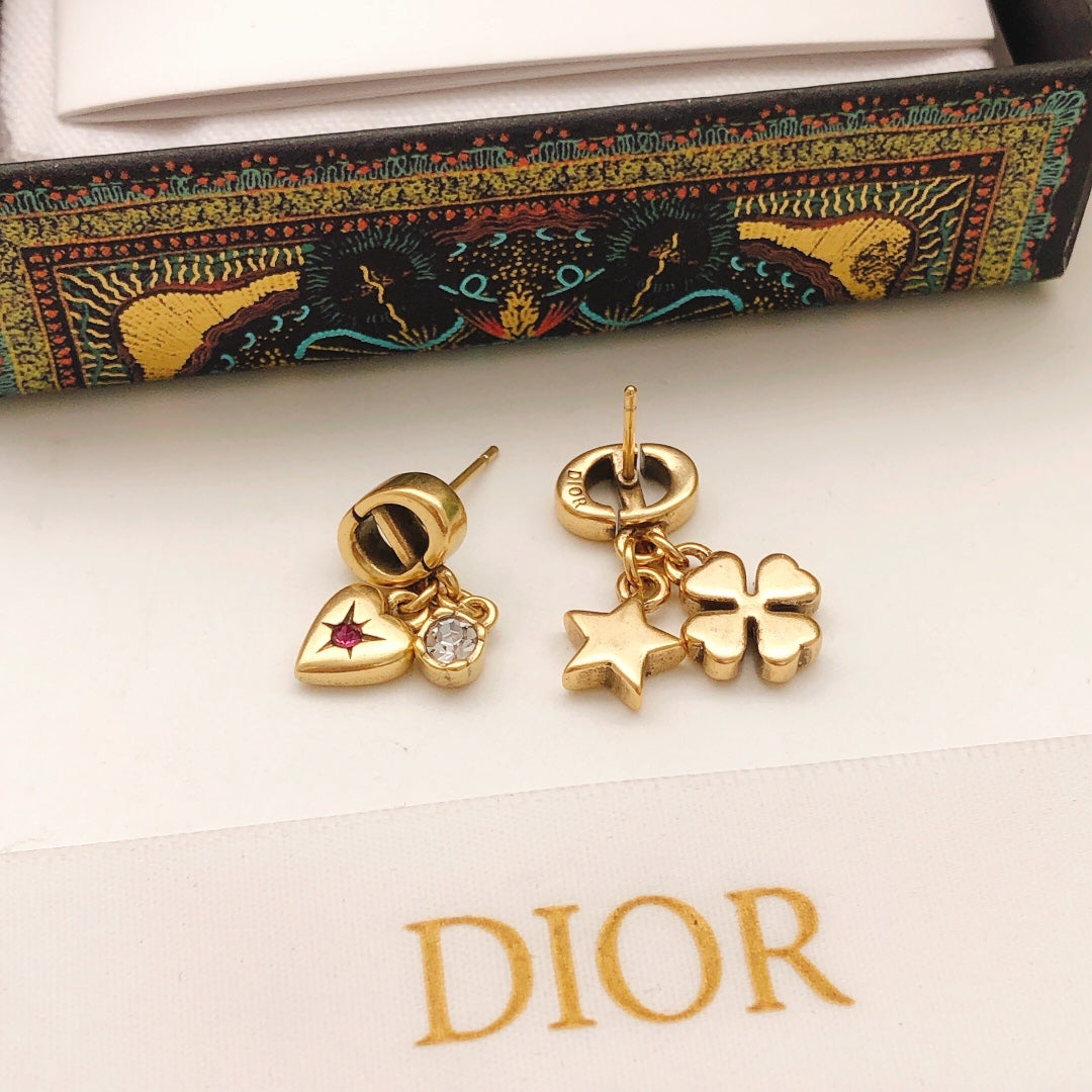 Martin Graham stud earrings in polished metal-tone