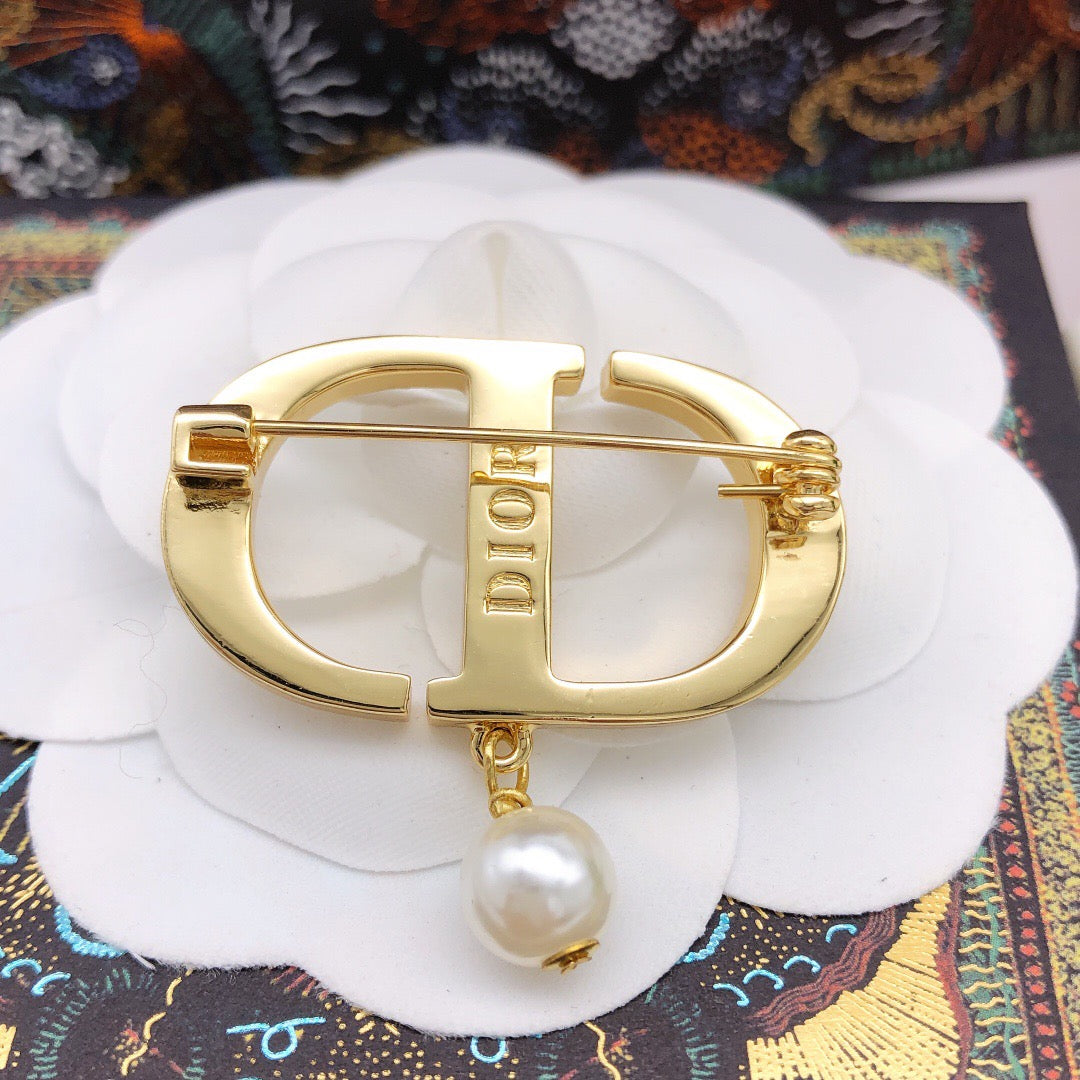 Martin Graham brooch in polished metal-tone