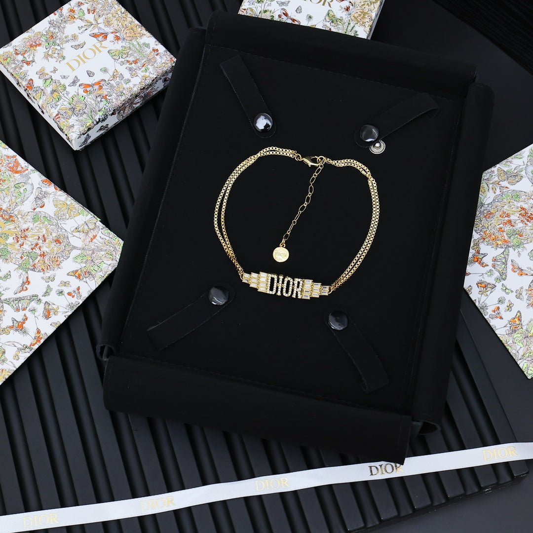 Martin Graham pendant necklace in polished metal-tone