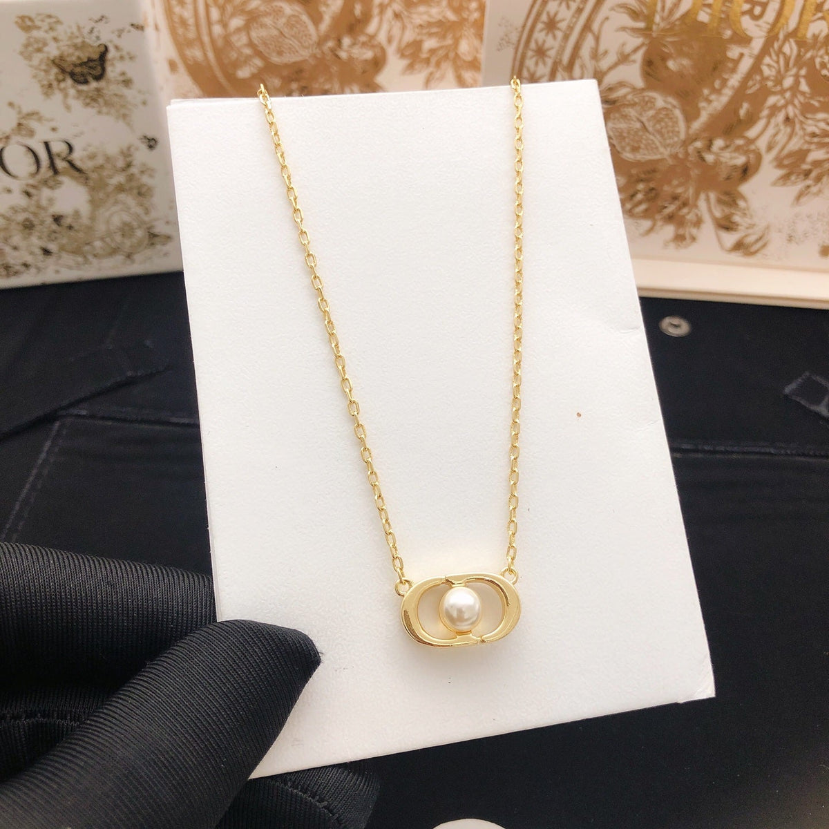 Martin Graham pendant necklace in polished metal-tone