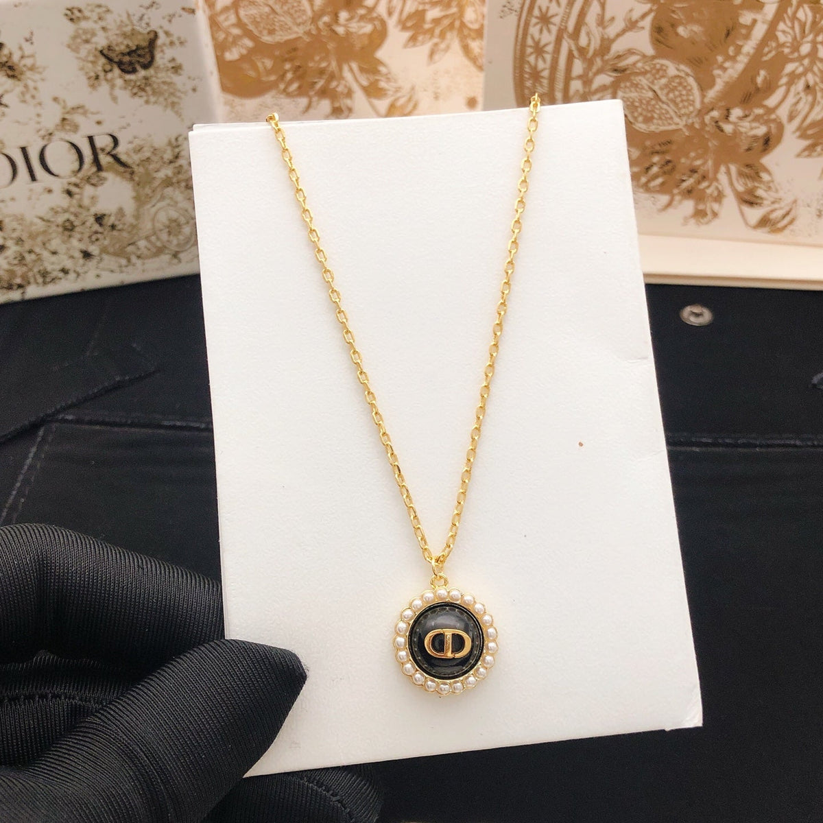 Martin Graham pendant necklace in polished metal-tone