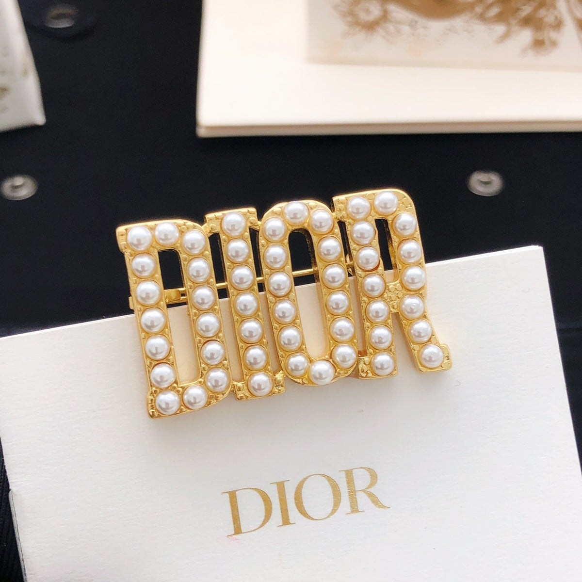 Martin Graham brooch in polished metal-tone