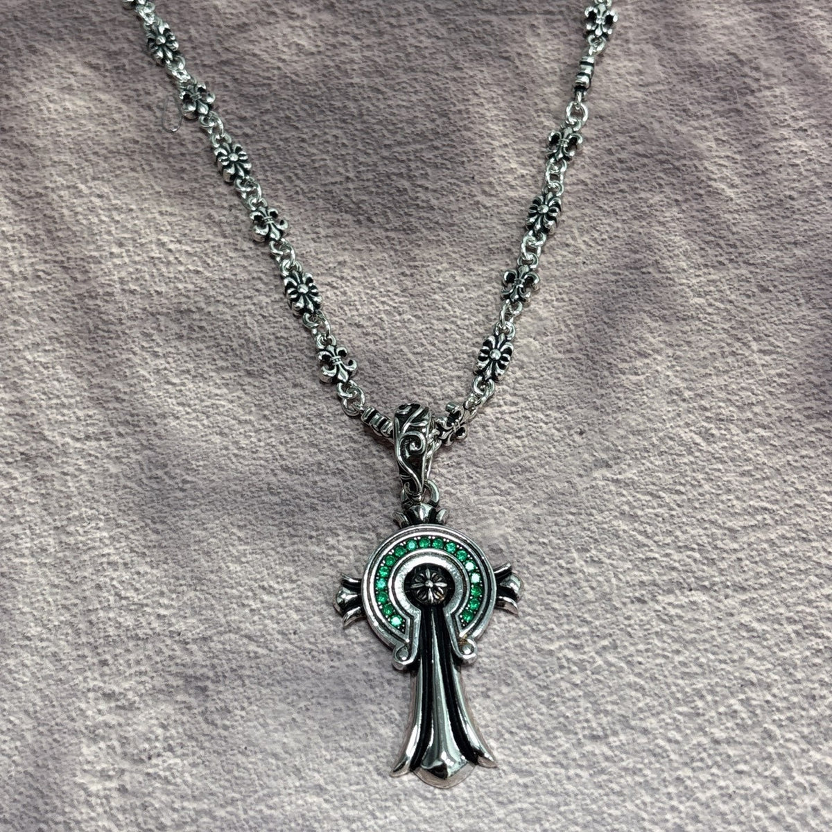 Martin Graham jewelry accessory in polished metal-tone – close-up detail