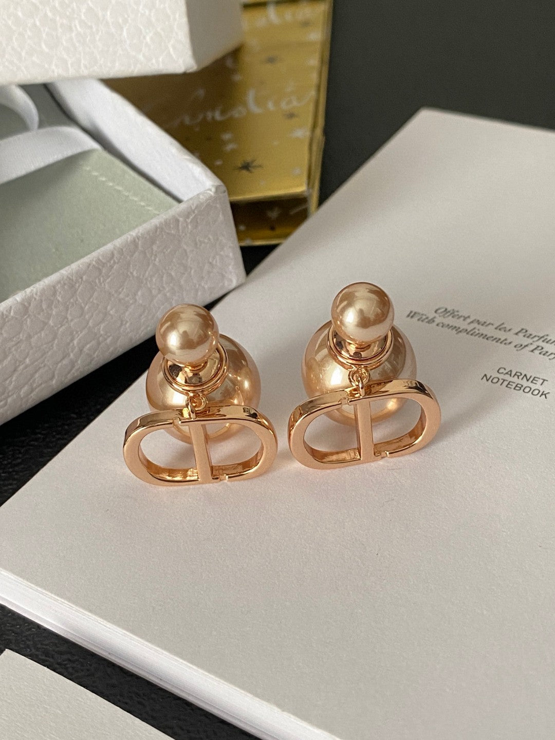 Martin Graham earrings in polished metal-tone