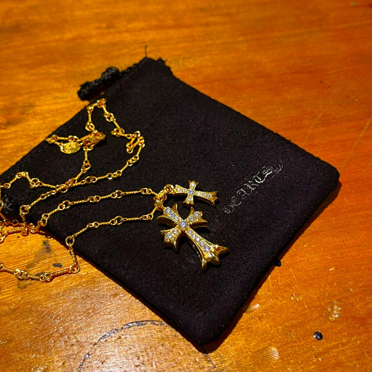 Martin Graham pendant necklace in polished metal-tone – close-up detail
