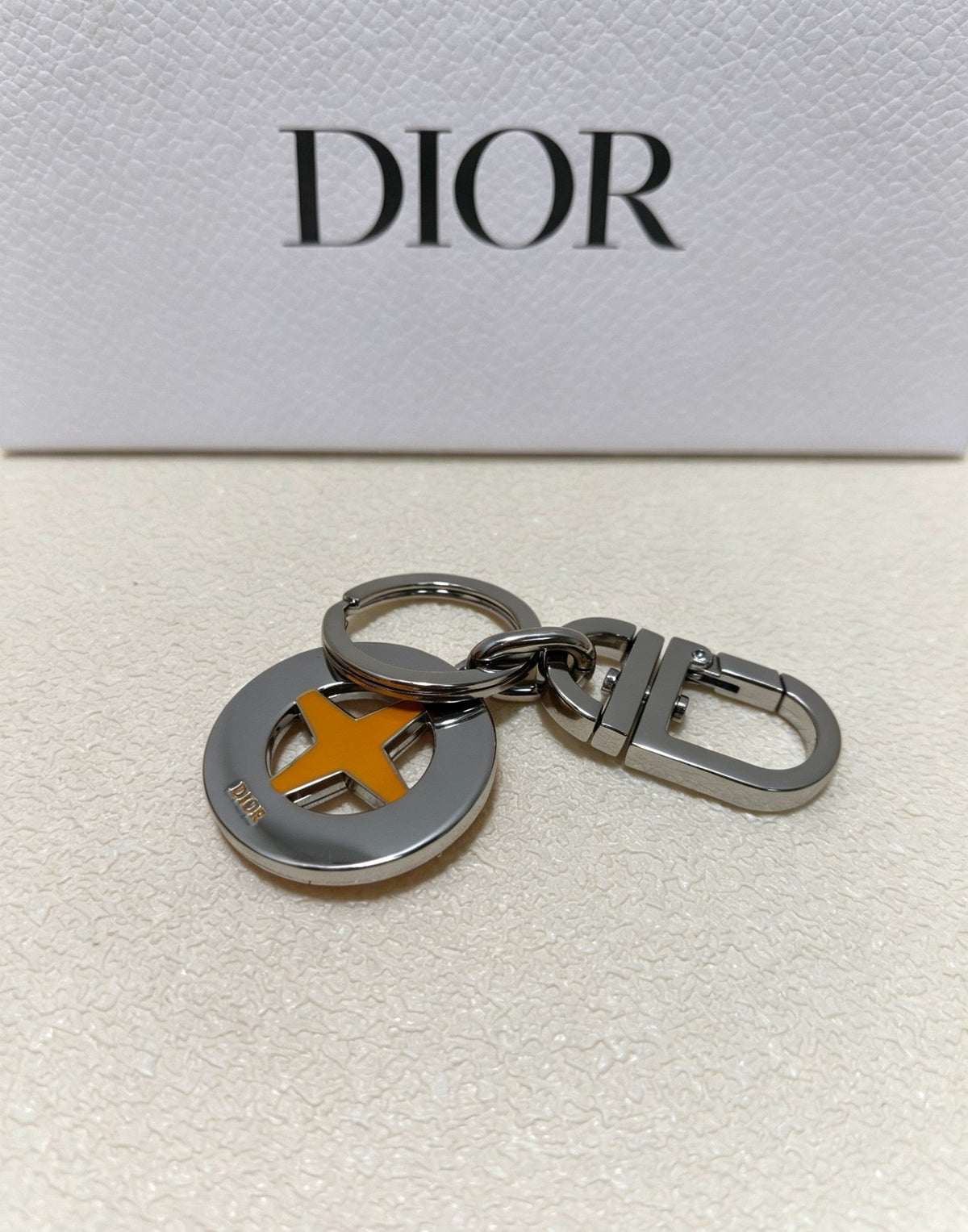 Martin Graham bag charm in polished metal-tone