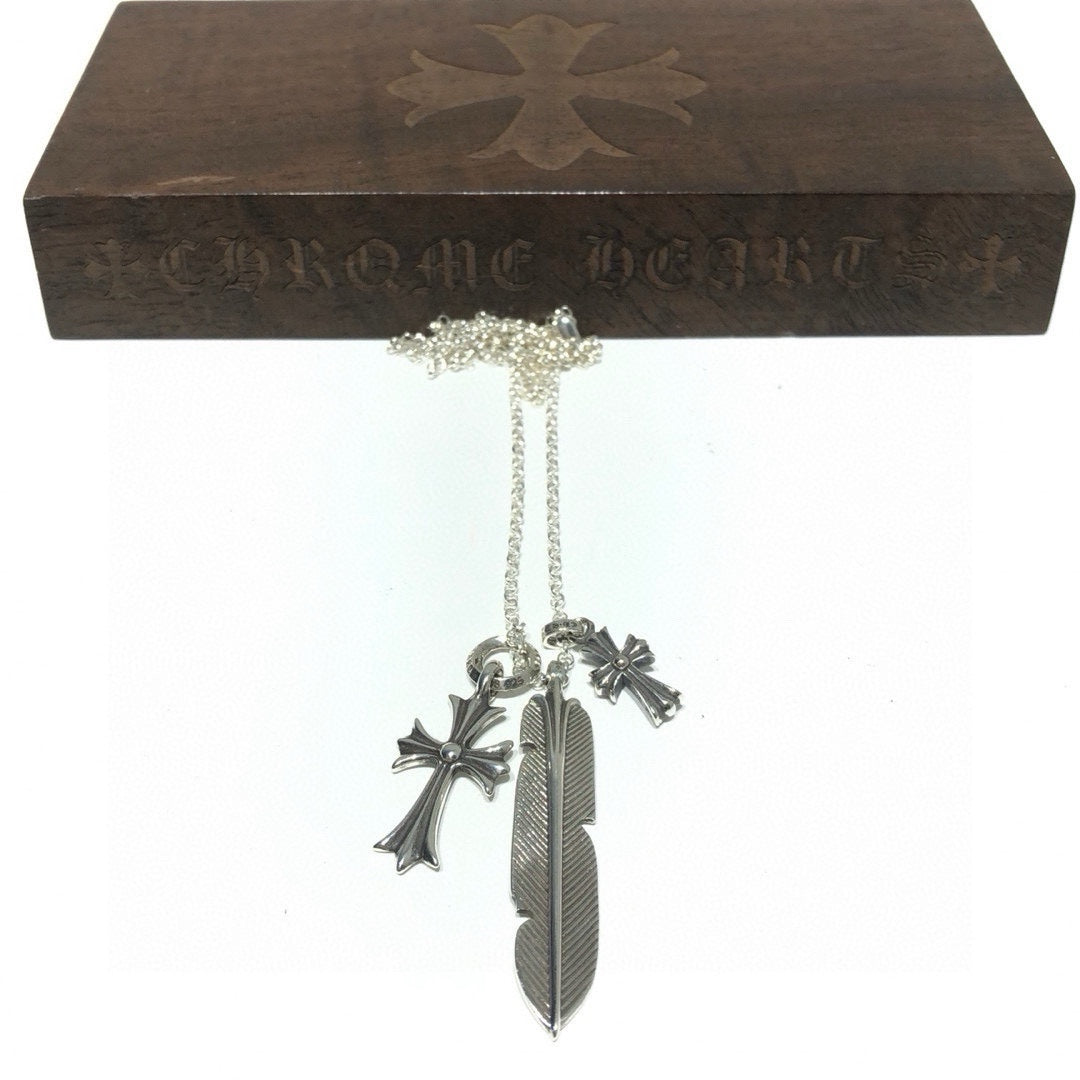 Martin Graham pendant necklace in polished metal-tone – close-up detail