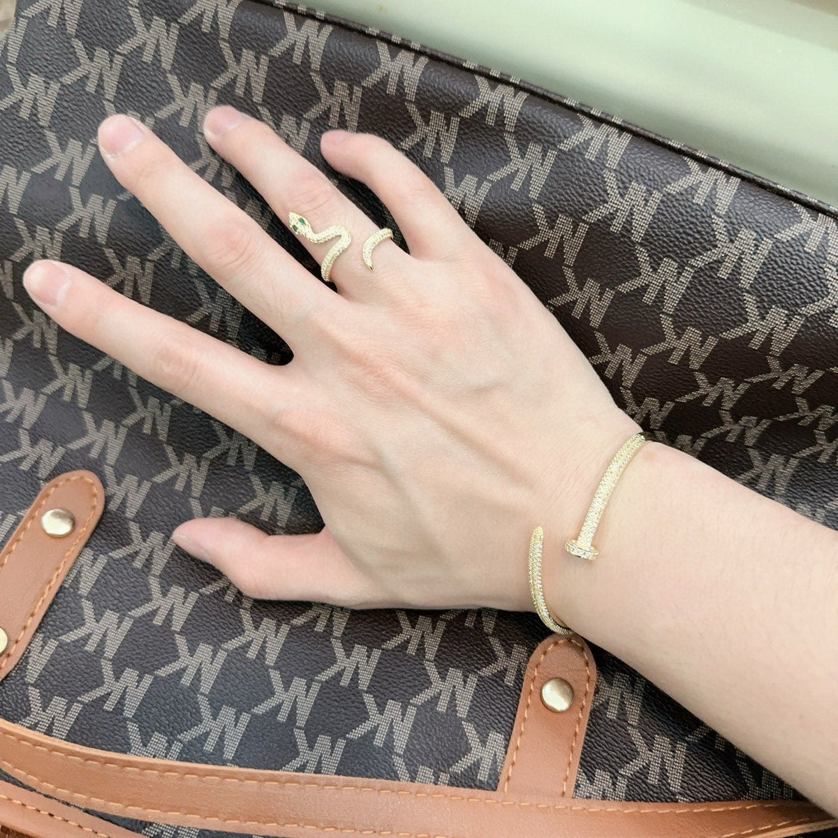Martin Graham bracelet in polished metal-tone