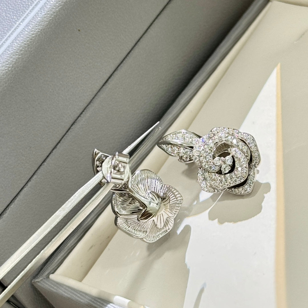 Martin Graham stud earrings in polished metal-tone