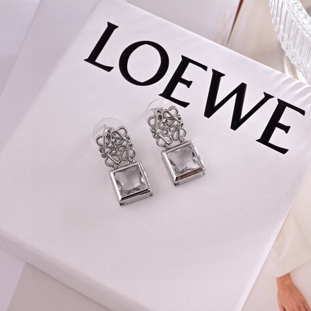 Martin Graham stud earrings in polished metal-tone