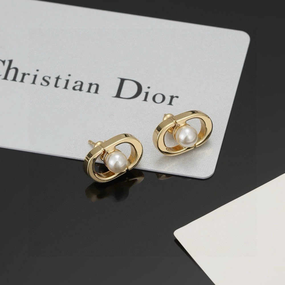 Martin Graham stud earrings in polished metal-tone