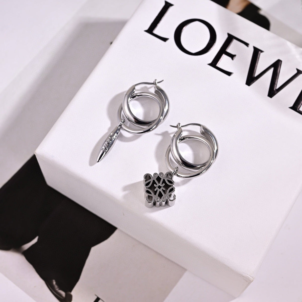 Martin Graham earrings in polished metal-tone