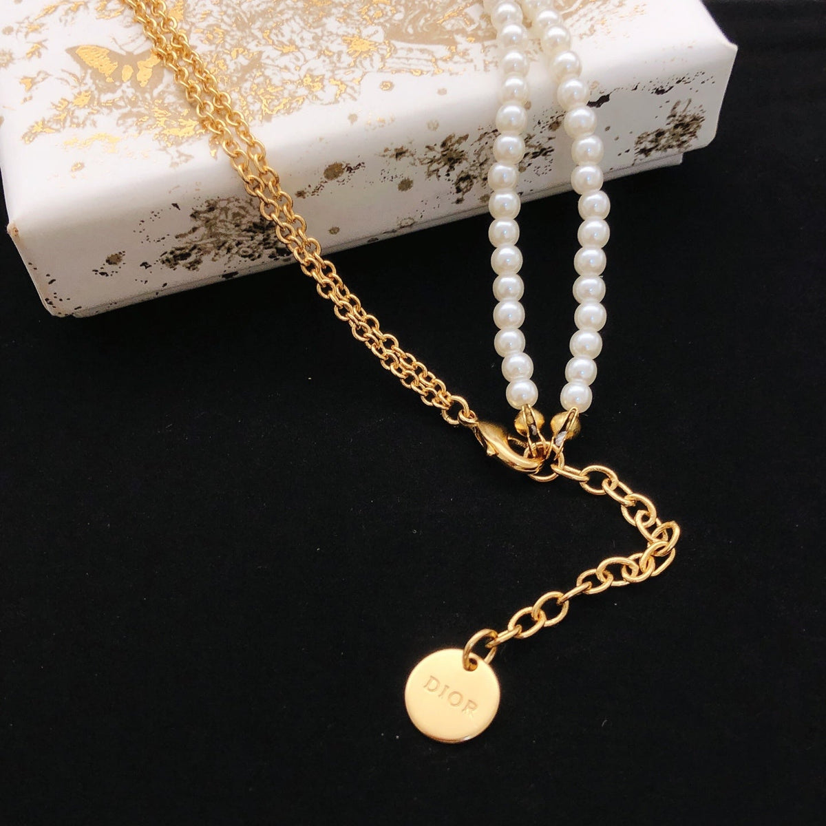 Martin Graham pendant necklace in polished metal-tone