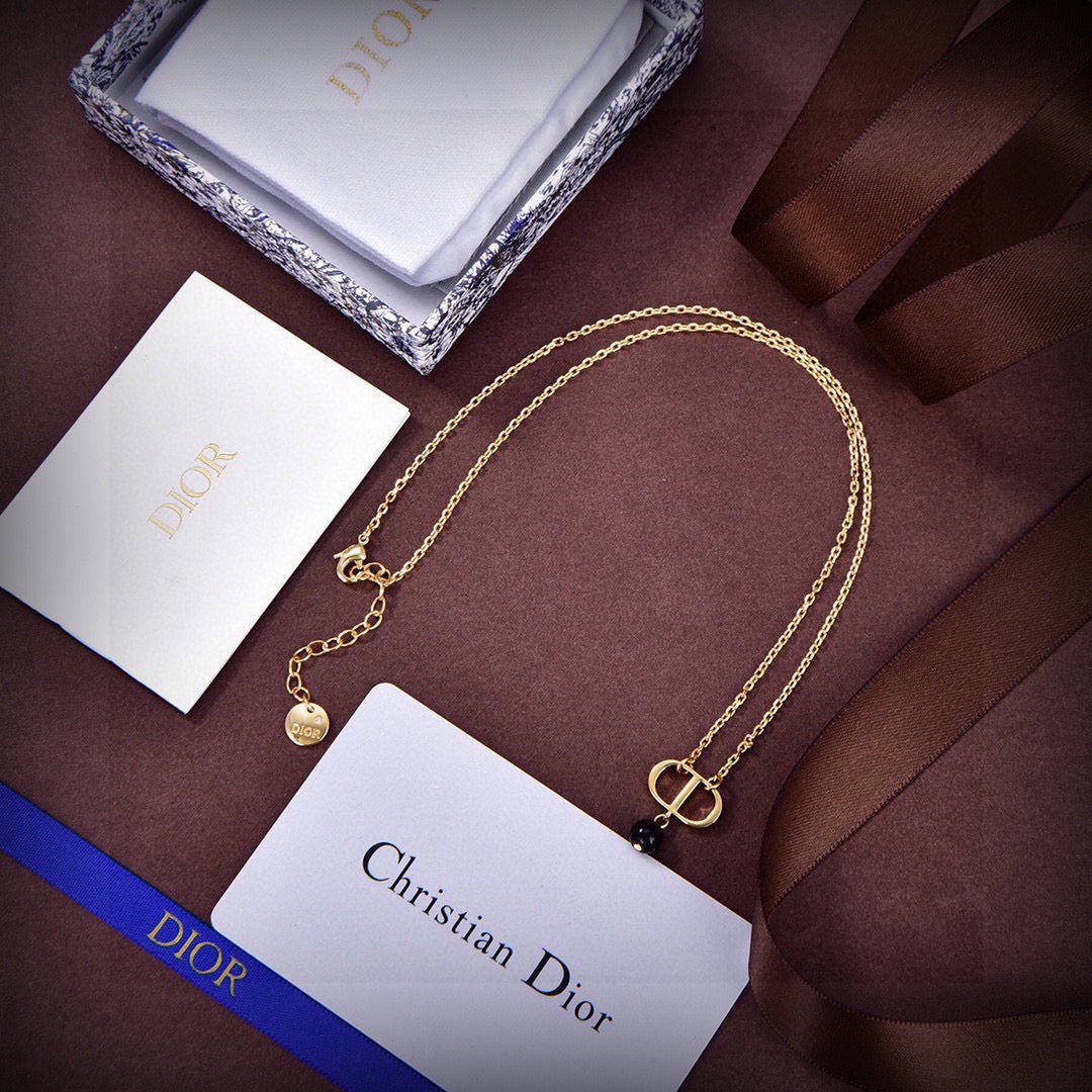 Martin Graham earrings in polished metal-tone