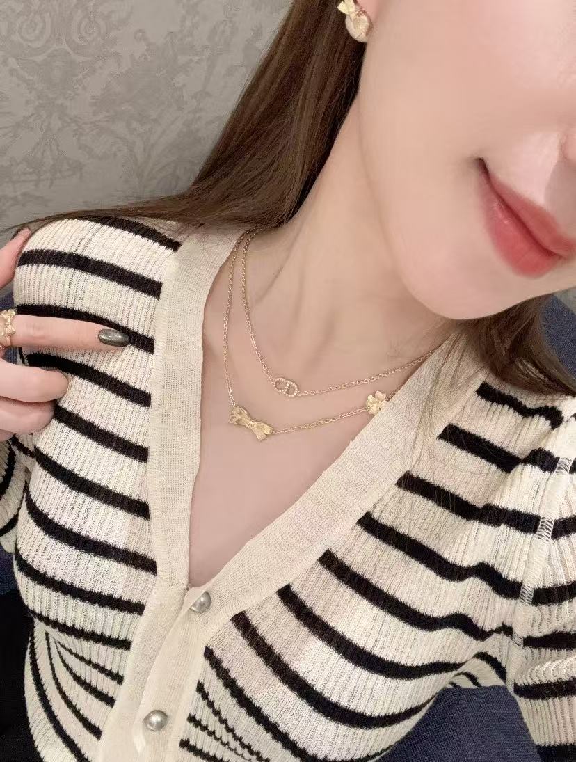 Martin Graham pendant necklace in polished metal-tone