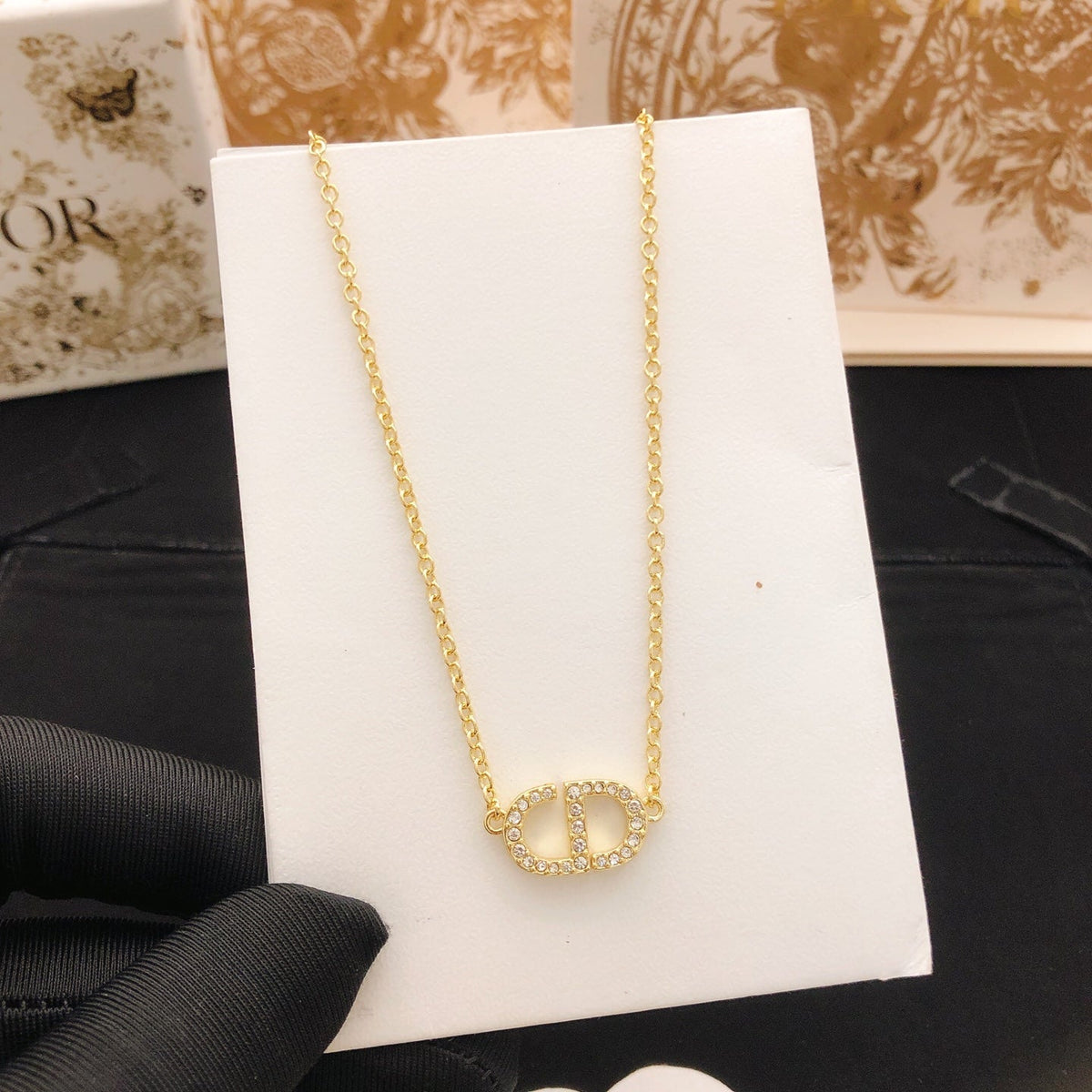 Martin Graham pendant necklace in polished metal-tone