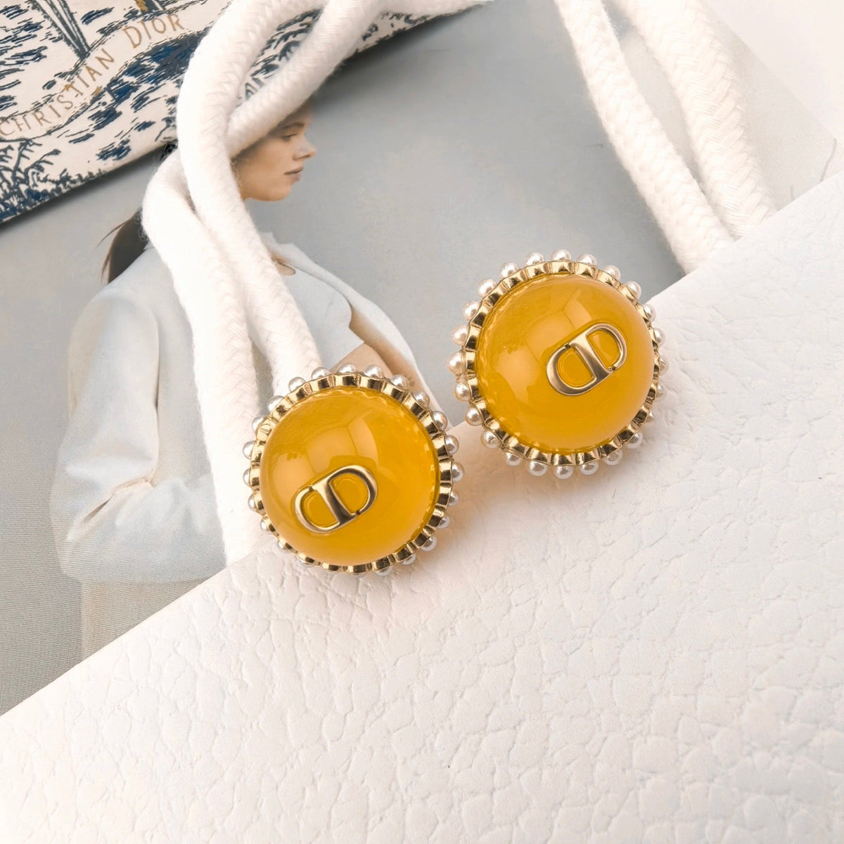 Martin Graham earrings in polished metal-tone