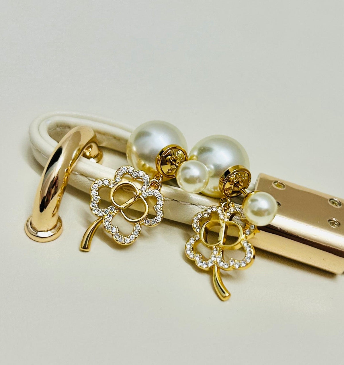 Martin Graham earrings in polished metal-tone
