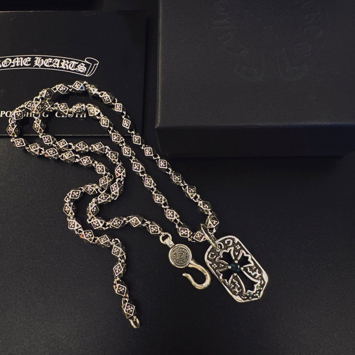 Martin Graham pendant necklace in polished metal-tone – close-up detail