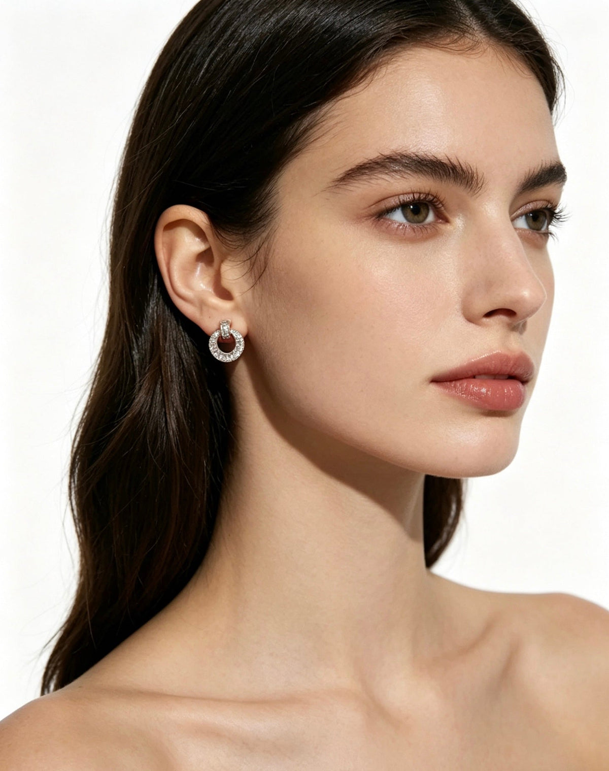 Martin Graham earrings in polished metal-tone