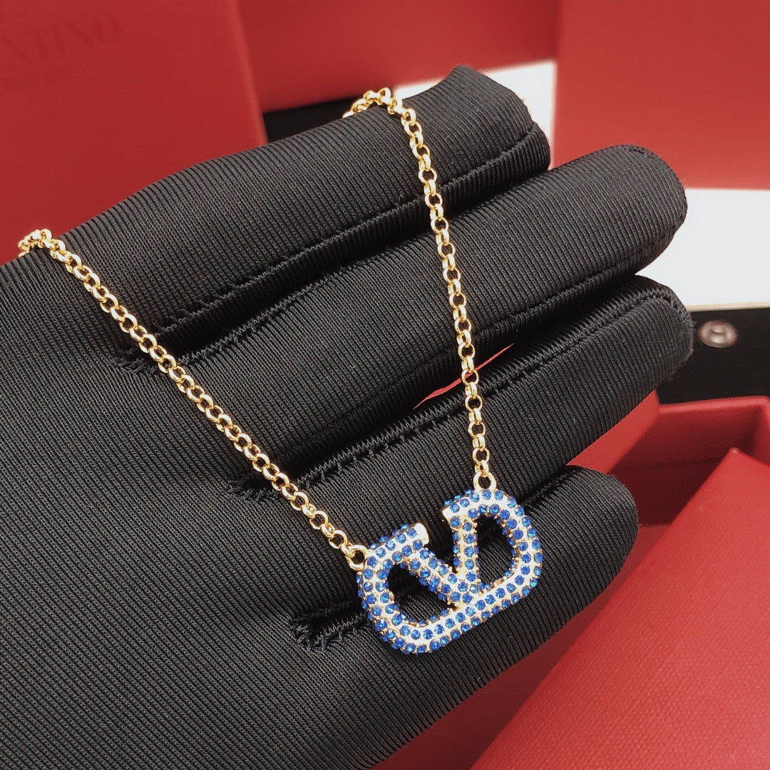 Martin Graham pendant necklace in polished metal-tone
