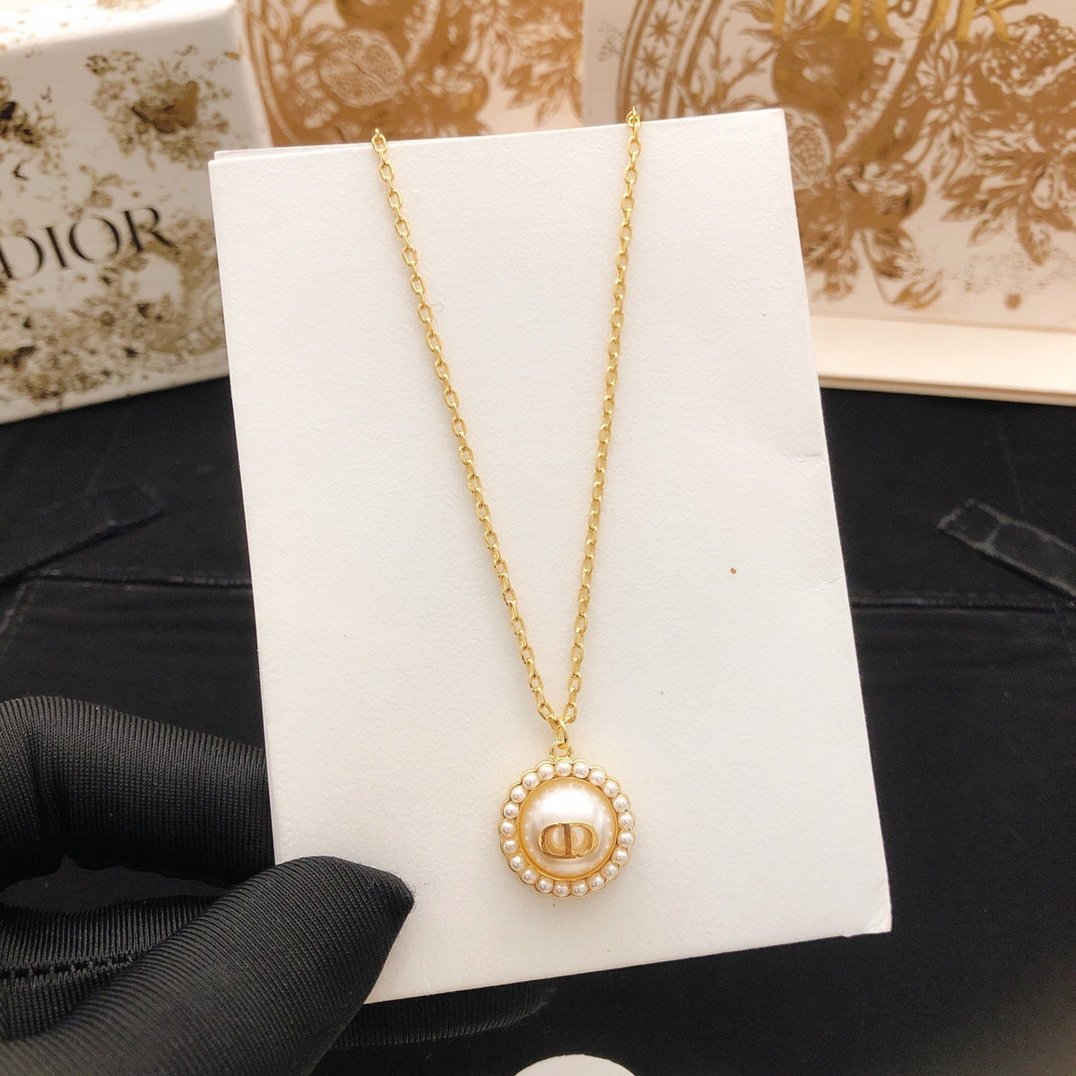 Martin Graham pendant necklace in polished metal-tone
