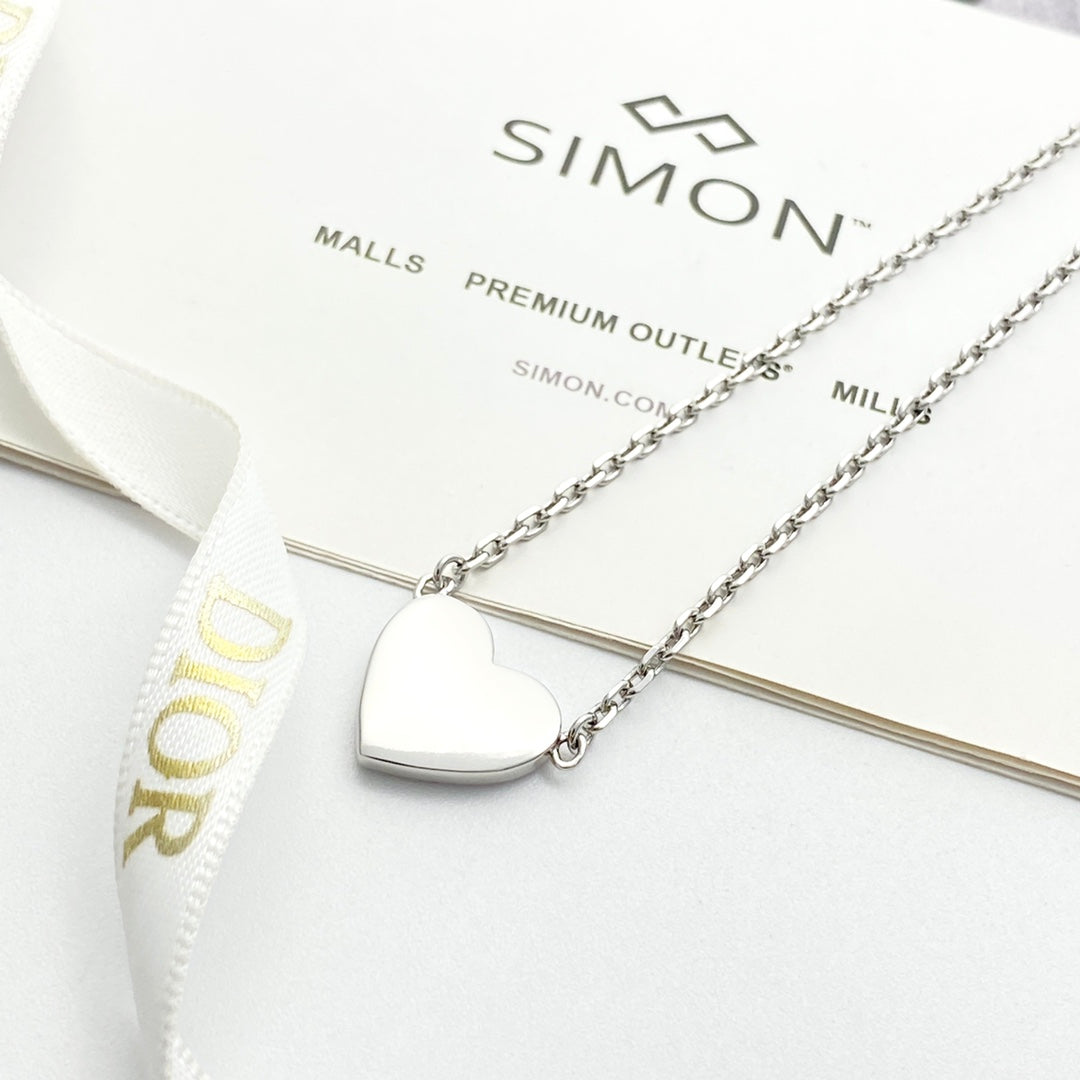 Martin Graham pendant necklace in polished metal-tone