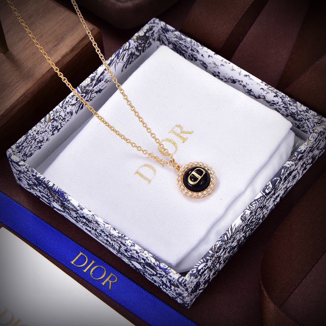 Martin Graham pendant necklace in polished metal-tone