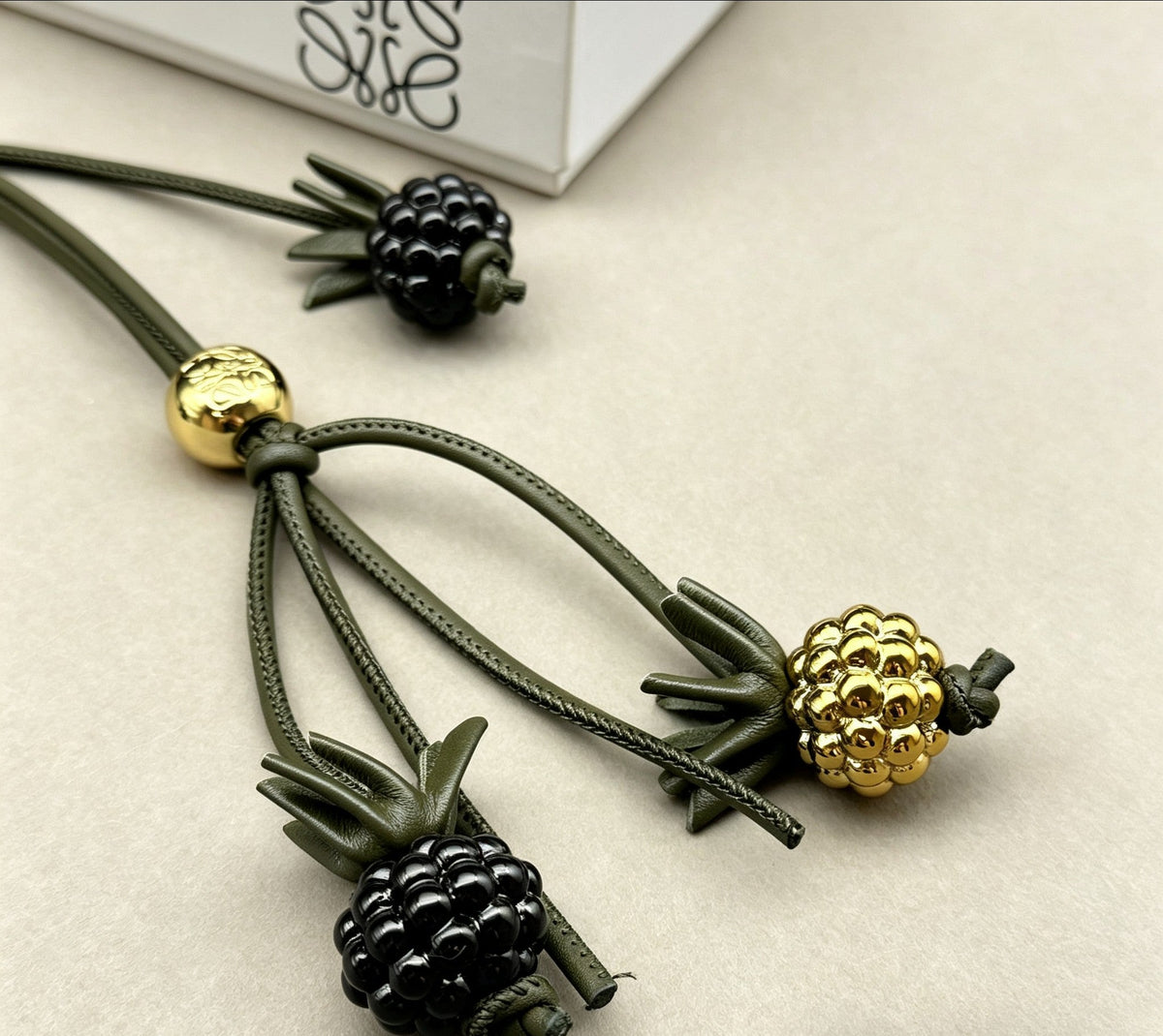 Martin Graham bag charm in polished metal-tone
