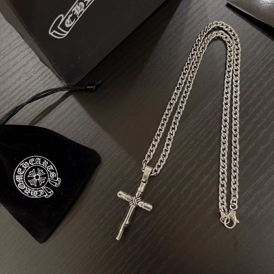 Martin Graham pendant necklace in polished metal-tone – close-up detail